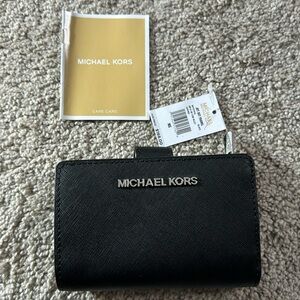 Michael kors jet set travel.